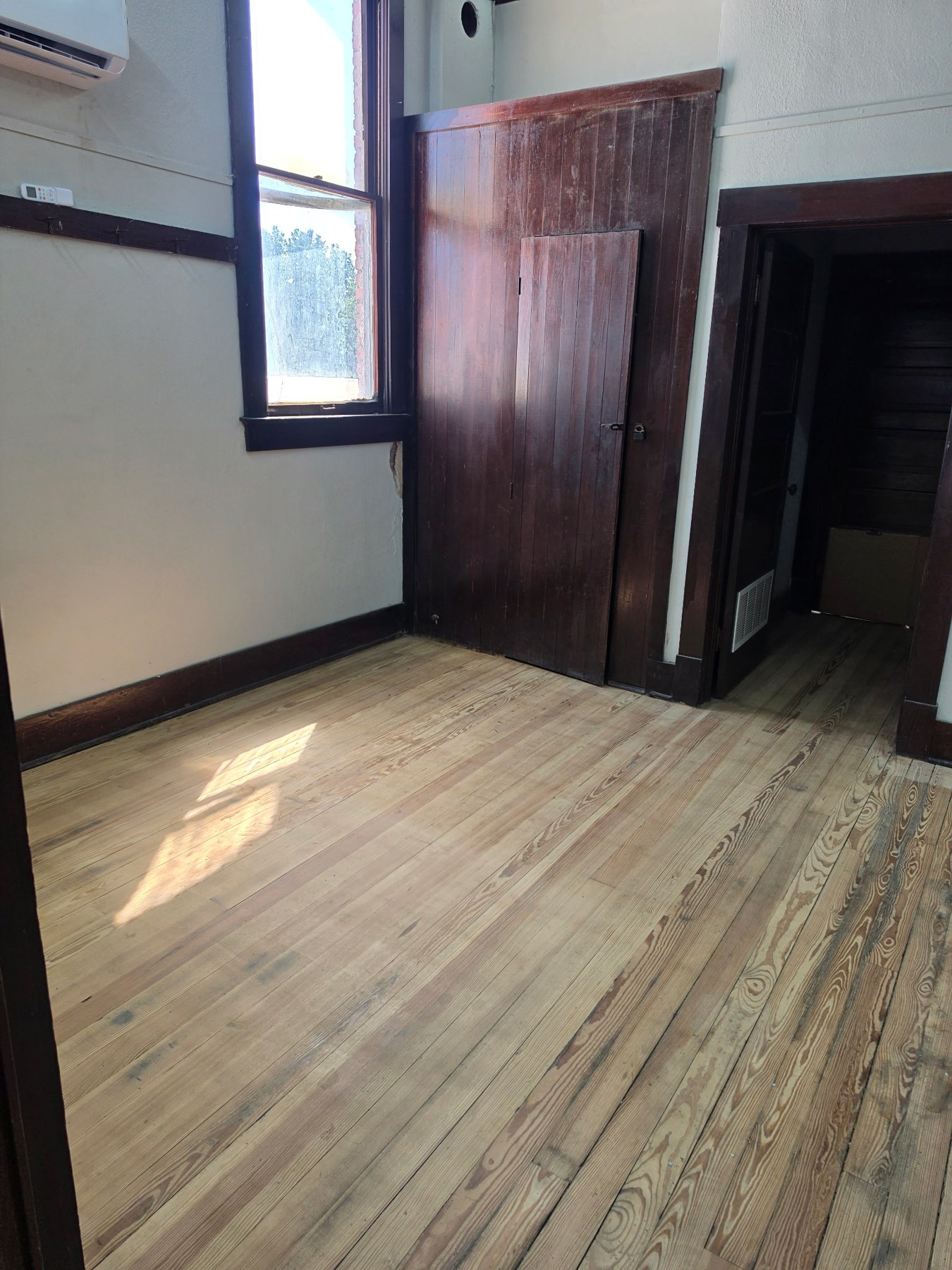 Tall window and retained woodwork